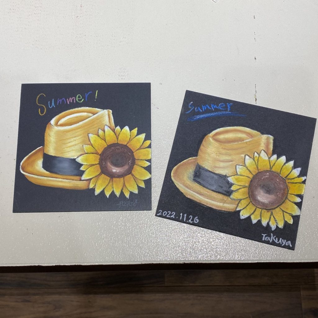 ひまわりと麦わら帽子の絵